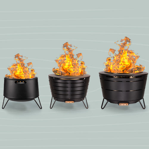 Three sizes of TIKI® fire pits with bright flames, shown on a light background.