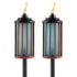 Blue Tiki torches with copper frames and black bases, lit flames.