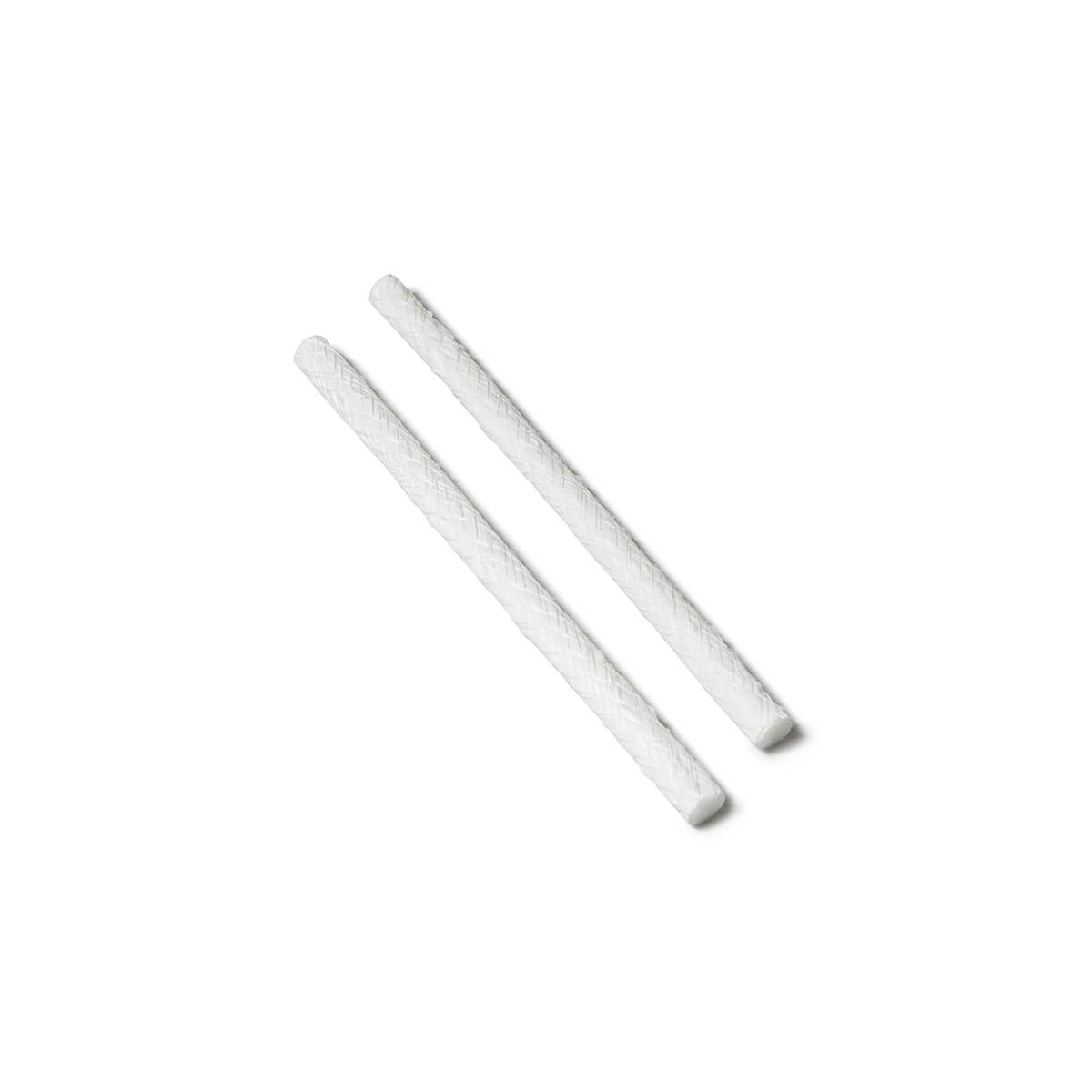White textured chopsticks on a plain background.