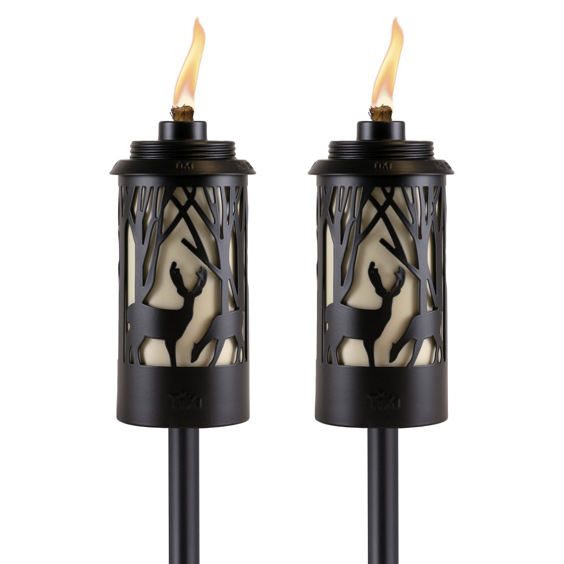 Black Tiki torches with deer and tree designs, flame lit.