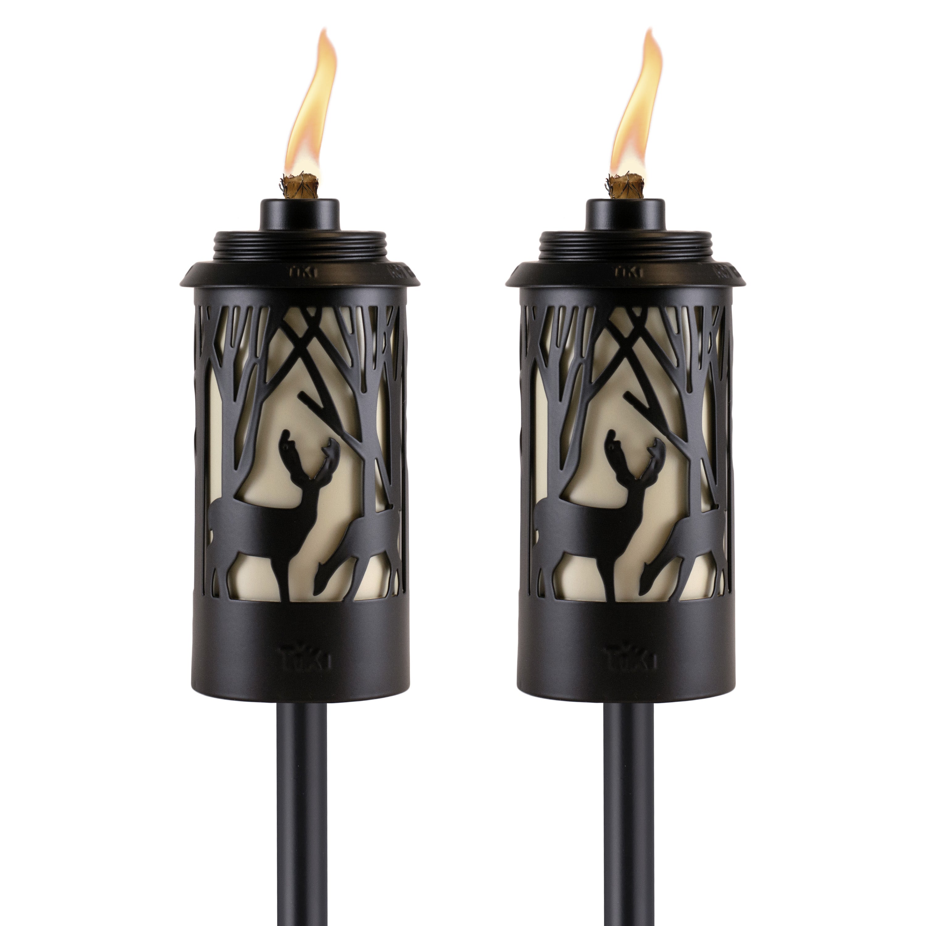 Black Tiki torches with deer and tree designs, flame lit.