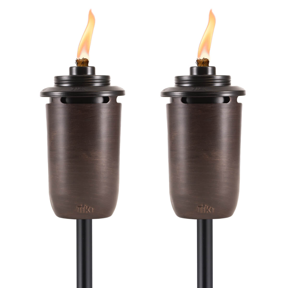 Bronze Tiki torches with flame, outdoor lighting.