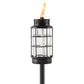 Black Tiki torch with glass cage and flame.