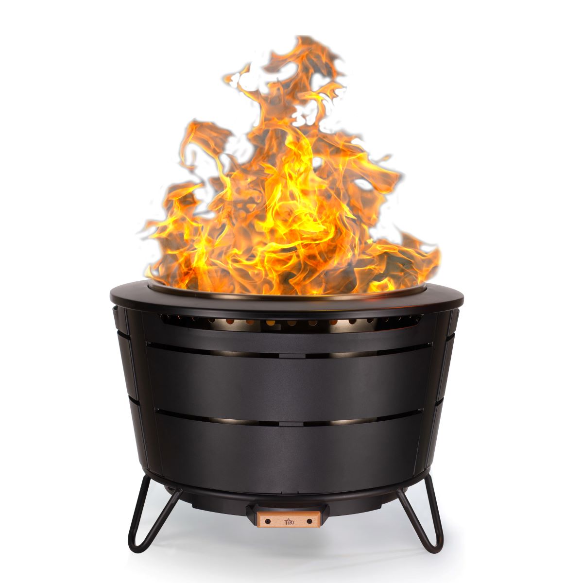 Black fire pit with roaring flames on stand.