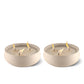 Beige Tiki triple-wick candles in textured ceramic holders.