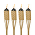 Set of four bamboo torches with black tops and lit flames.