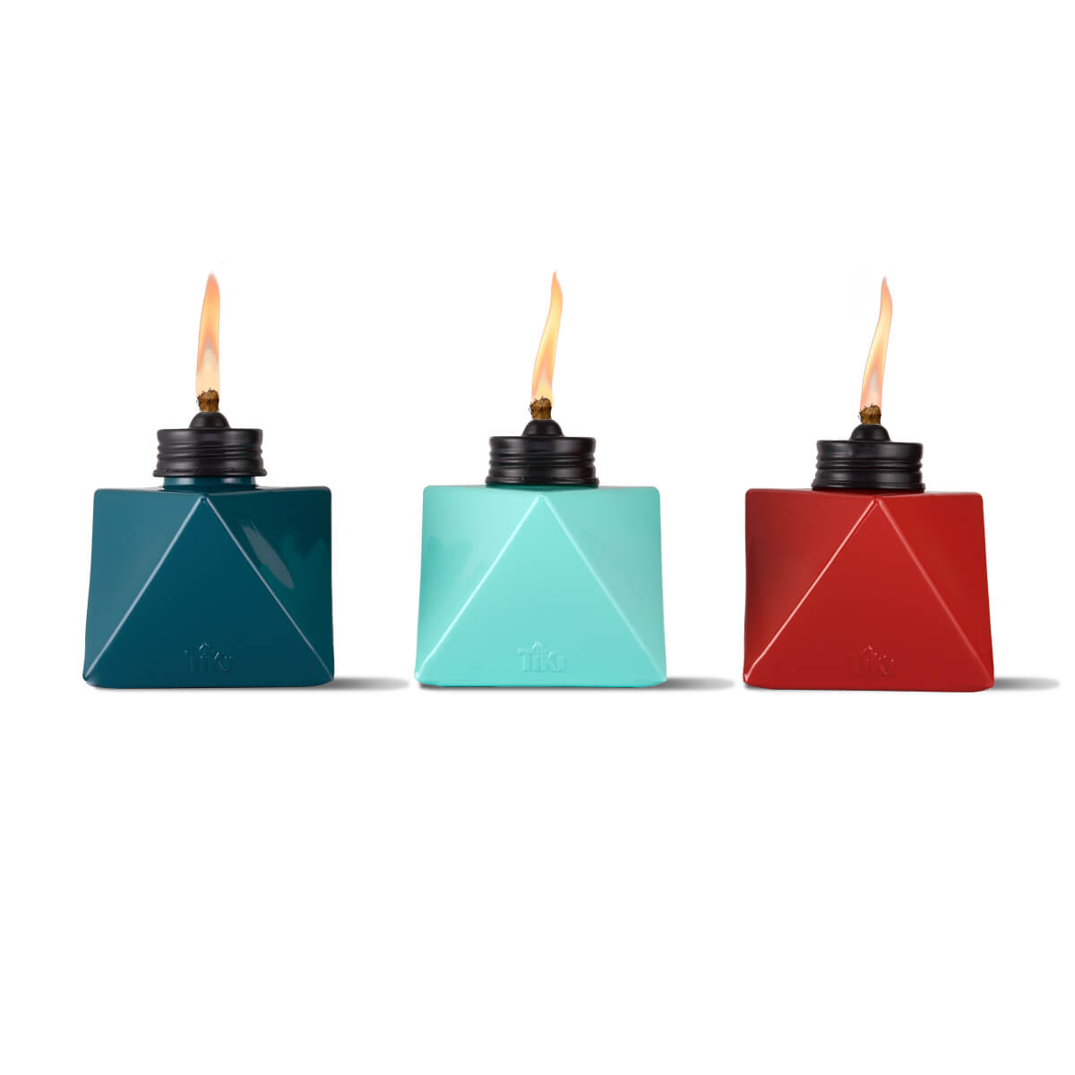 Blue, teal, and red geometric oil lamps with flames.