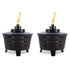 Black Tiki torches with flame, outdoor lighting.
