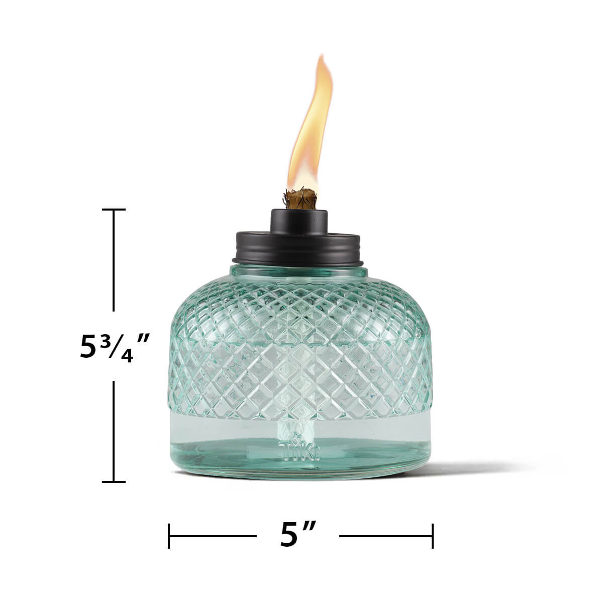 Turquoise glass oil lamp with flame, 5 3/4" tall, 5" wide.