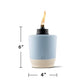 Light blue TIKI torch, 6" tall, 4" wide, with flame.