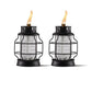 Black glass lanterns with flame, outdoor lighting.