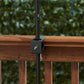 Black metal railing post bracket for wooden deck rail installation.